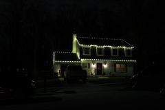 Holiday lighting installation in Sykesville, MD. A classic warm white roofline lights creating a cozy, elegant glow.